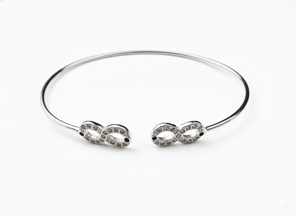 Pulsera Abierta Infinito en Plata .925 con Detalle de Zafiro